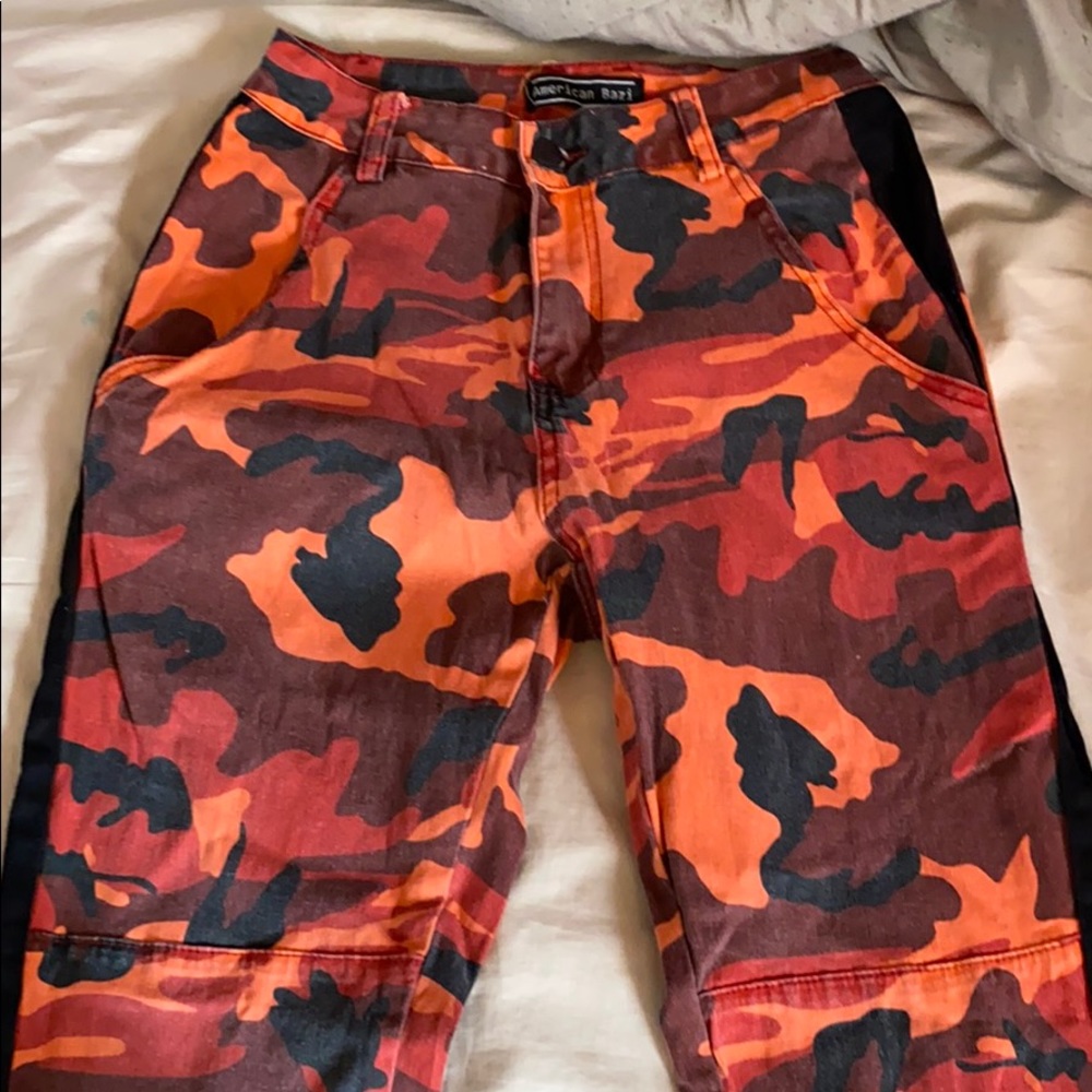 I am selling red and black Camo pants
